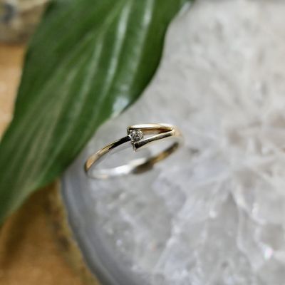 Image 2 of Two-tone gold ring with 0.05 ct diamond.