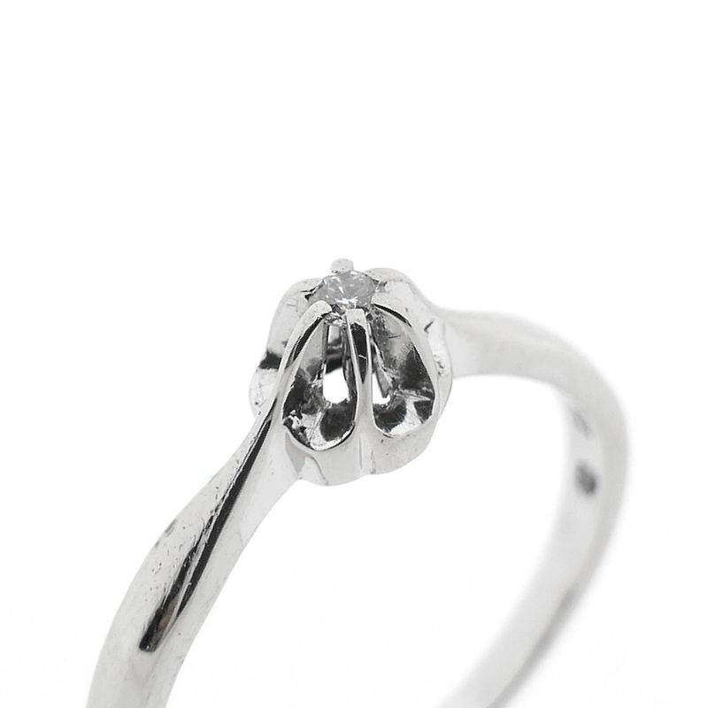 Image 3 of White gold solitaire ring with 0.03 ct diamond.