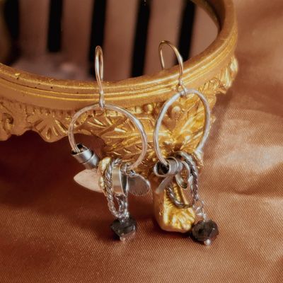 Image 2 of Silver earrings with a mix of pendants