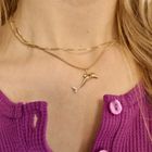 Image 7 of Two-tone gold dolphin pendant with diamond; 0.005 ct.