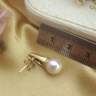 Image 6 of 18 carat gold stud earrings with cultured pearl and 0.18 ct diamond.