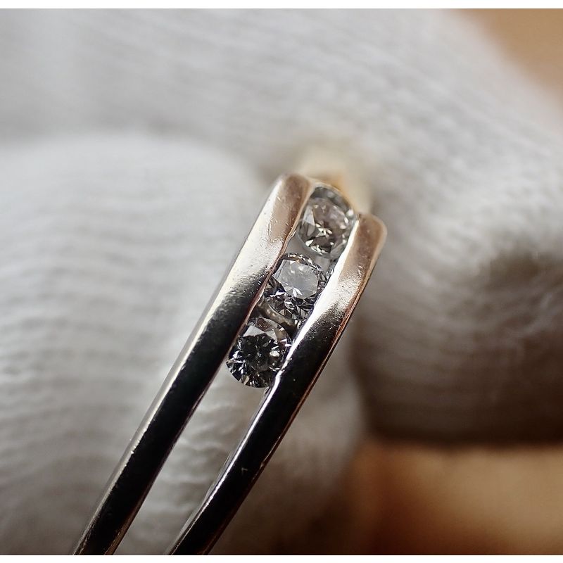 Image 3 of Two-tone gold subtle ring with diamonds; 0.10 ct.