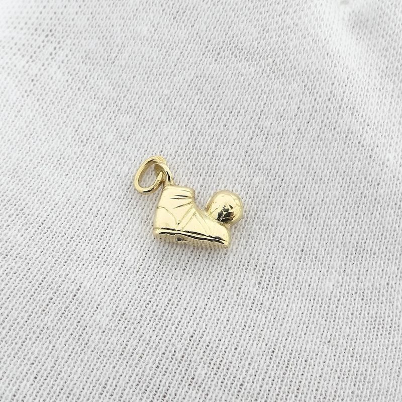 Image 9 of Gold pendant of a football with a shoe