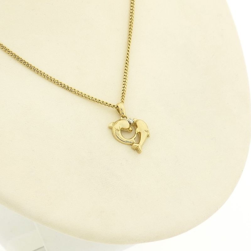 Image 10 of Gold pendant of two dolphins with diamond 0.015 ct.