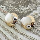 Image 2 of Talento two-tone gold earrings with mother-of-pearl and diamond; 0.04 ct.