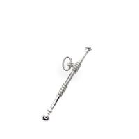 Silver charm of a baton majorette