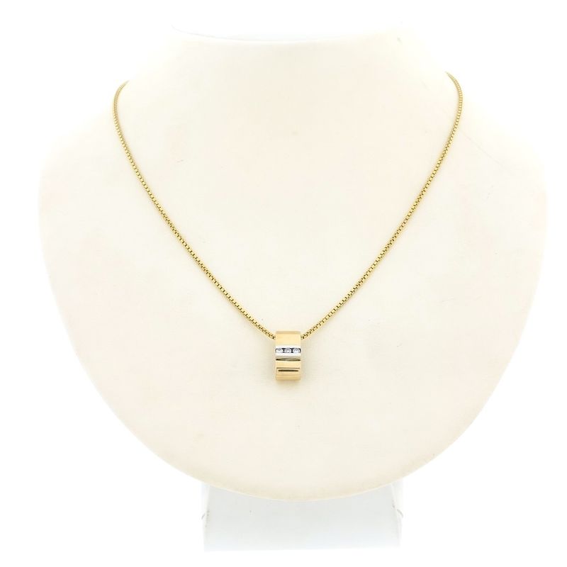 Image 3 of Two-tone gold pendant with diamond; 0.10 ct.