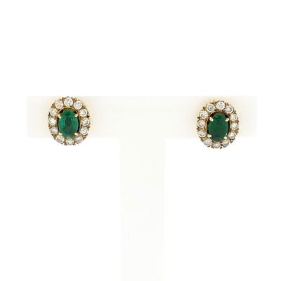 Image 1 of Gold earrings with emerald and diamonds; 0.48 ct.