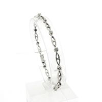White gold fantasy link bracelet with diamonds; 0.24 ct.