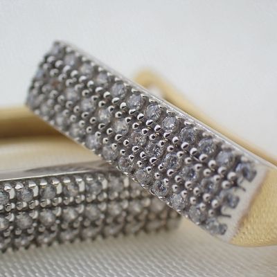 Image 2 of Gold stud earrings with pavé set with diamonds