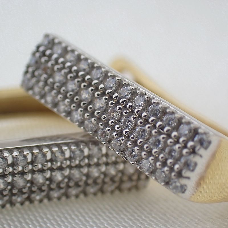 Image 2 of Gold stud earrings with pavé set with diamonds