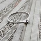 Image 2 of White gold solitaire ring with 0.04 ct diamond.