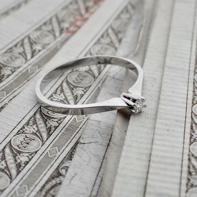 Image 2 of White gold solitaire ring with 0.04 ct diamond.