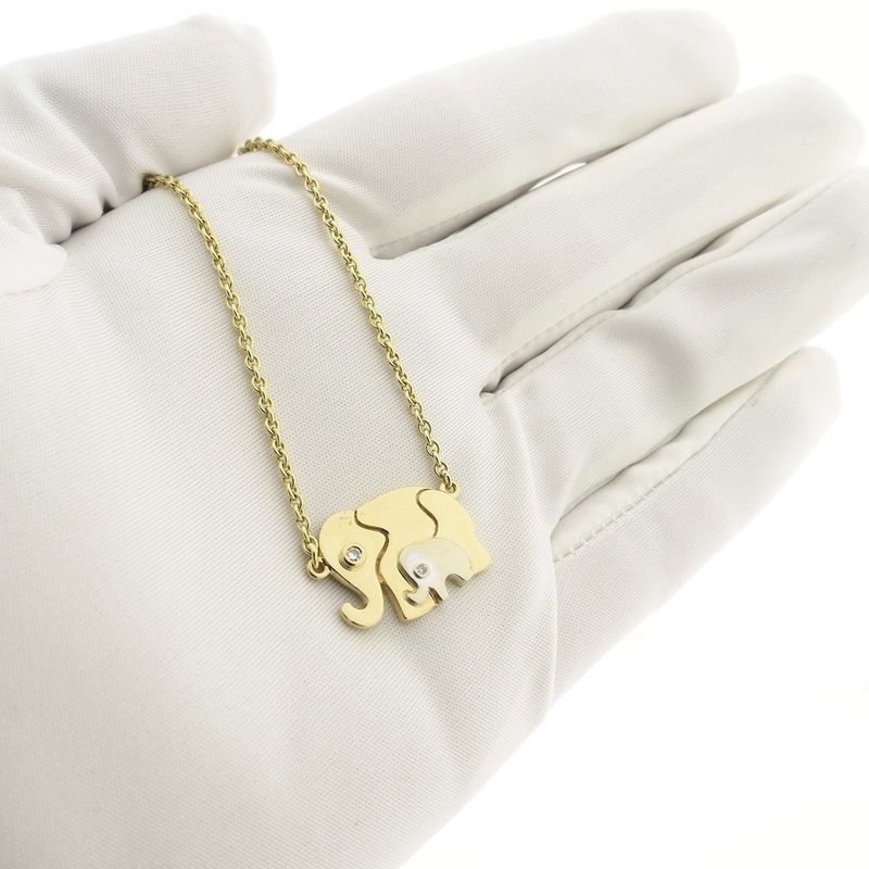 Image 9 of Two-tone gold necklace with fixed pendant and diamonds; 0.03 ct.