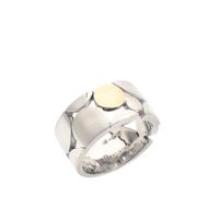 Silver ring with gold circle | Breuning