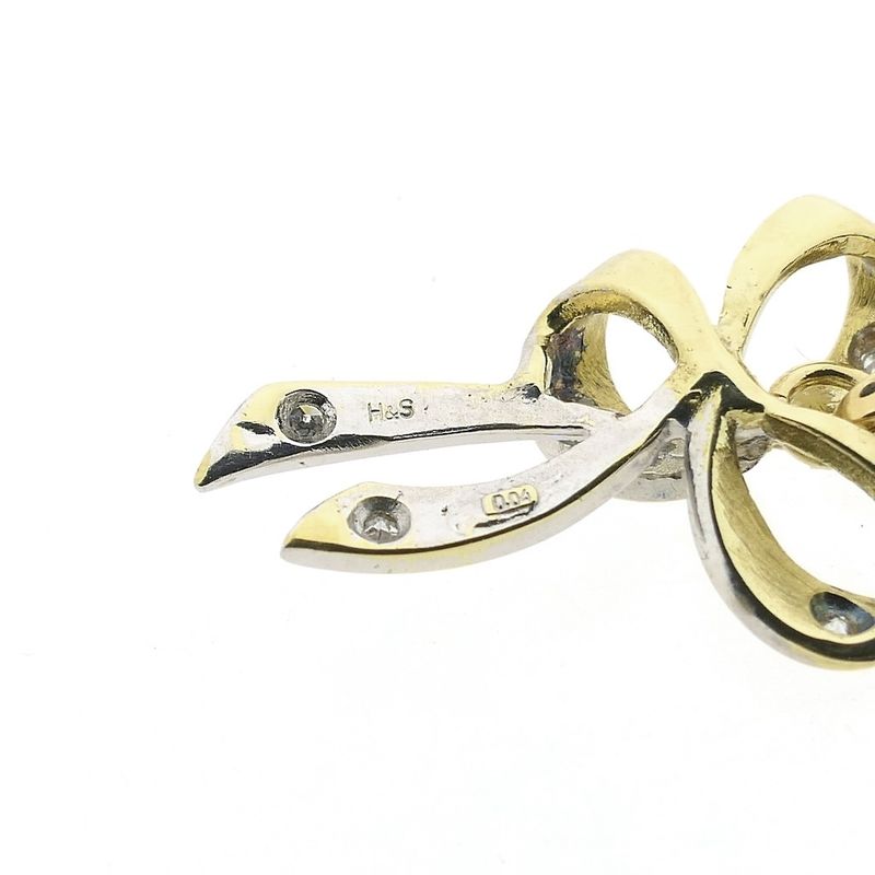 Image 6 of Two-tone gold bow pendant with diamond | 0.04 ct.