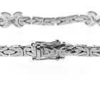 Image 5 of White gold flat king bracelet with fixed charms and 0.24 ct diamond.