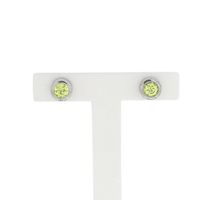 Silver stud earrings with green zirconia