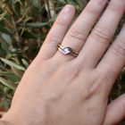 Image 3 of Two-tone gold solitaire ring with 0.17 ct diamond.