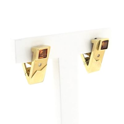 Image 2 of Gold stud earrings with synthetic orange sapphire and zirconia