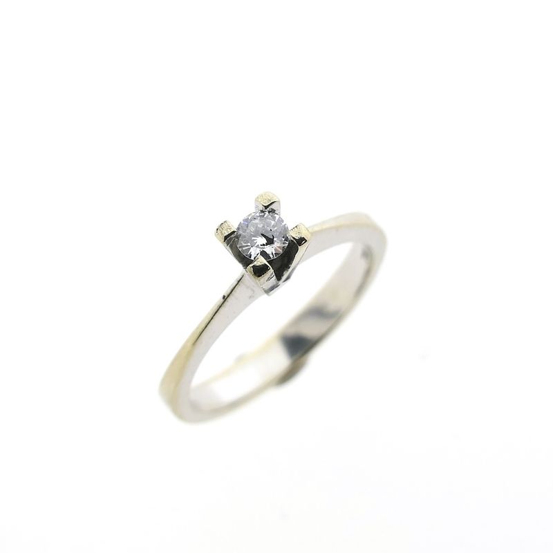 Image 1 of White gold solitaire ring with 0.14 ct diamond.
