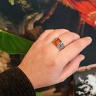 Image 4 of Silver ring with orange zirconia and Maori pattern