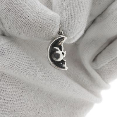 Silver pendant of a moon with a face Image 1 of Silver pendant of a moon with a face