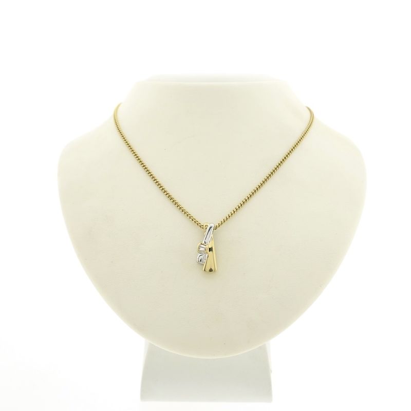 Image 5 of Two-tone minimalist pendant with diamond; 0.04 ct.