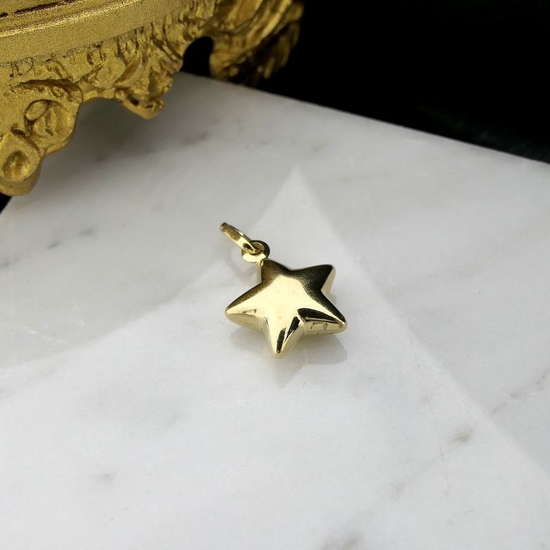 Image 7 of Gold pendant of a star