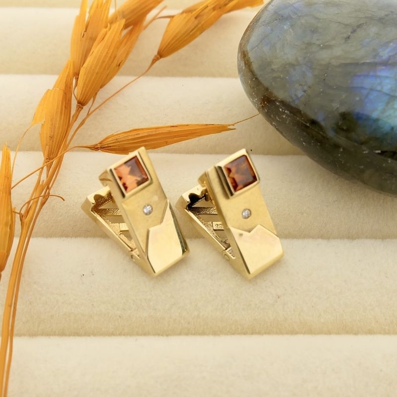 Image 6 of Gold stud earrings with synthetic orange sapphire and zirconia