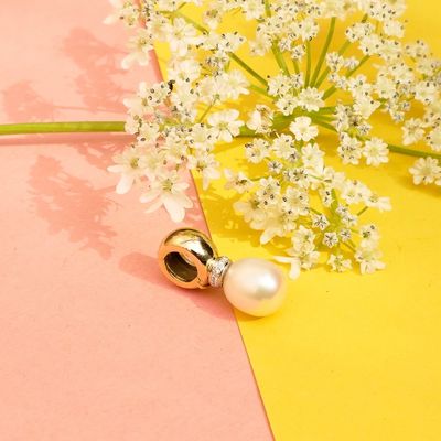 Image 2 of Gold pendant with pearl and diamonds; 0.035 ct.