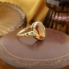 Image 4 of Gold ring set with synthetic orange gemstone