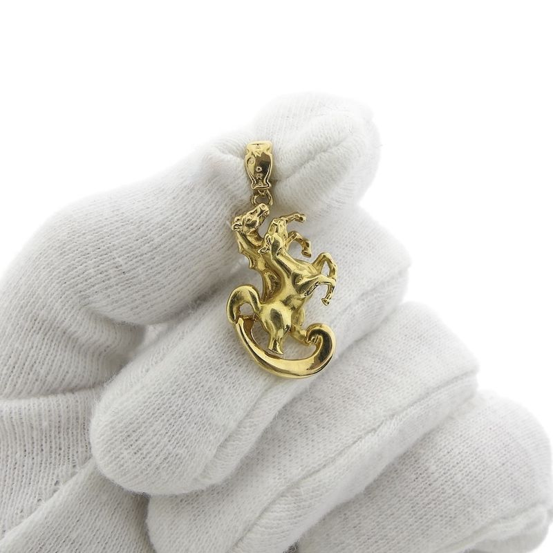 Image 8 of 18 carat gold pendant of a horse with foal