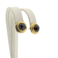 Vintage gold stud earrings with garnet