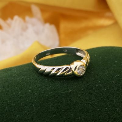 Image 2 of Two-tone gold solitaire ring with zirconia.