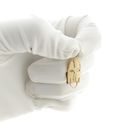 Image 10 of 18 carat gold pendant of a mask