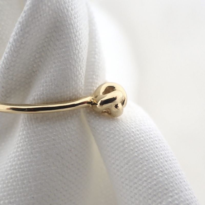 Image 4 of Gold subtle ring with knot