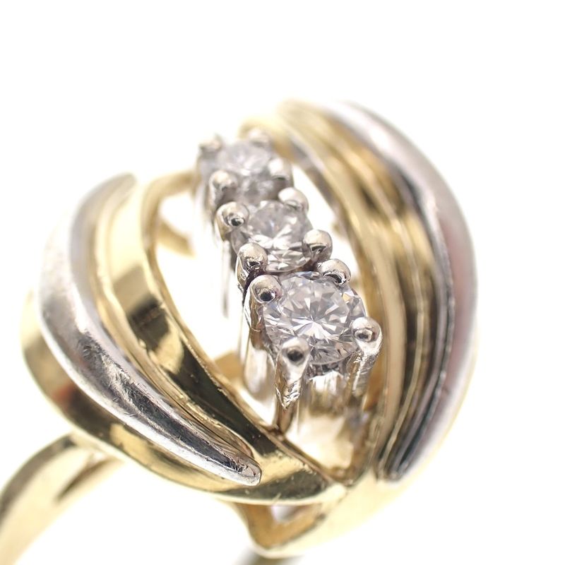 Image 4 of Two-tone gold fantasy ring set with 0.13 ct diamond.