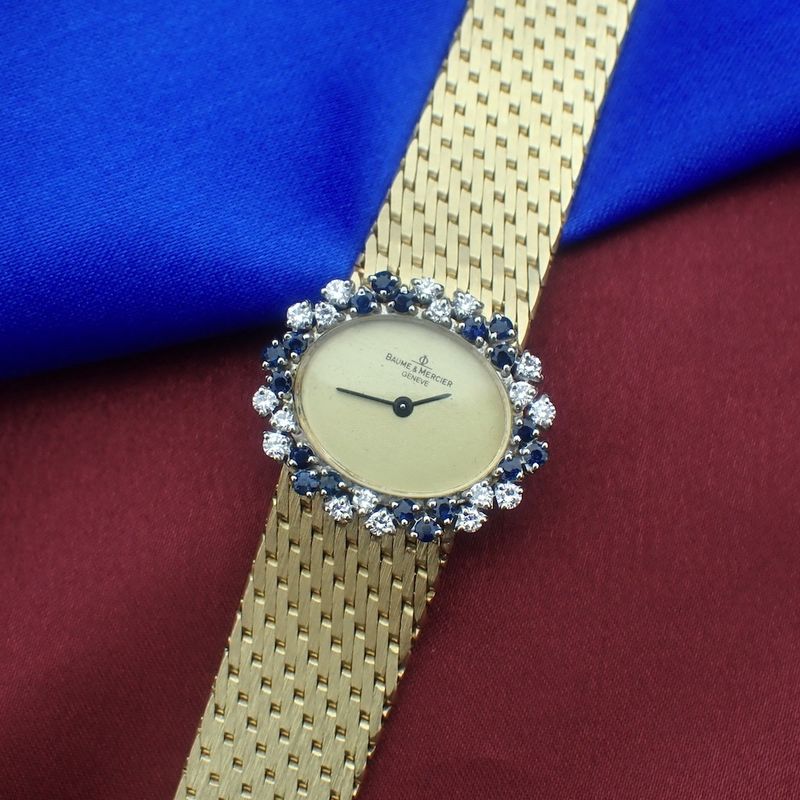 Image 2 of Baume Mercier Vintage; 14k. gouden horloge met briljanten en saffier