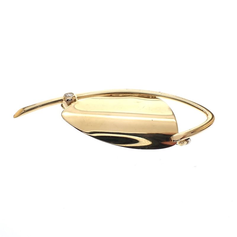 Image 1 of Golden fantasy brooch with diamond; 0.07 ct.