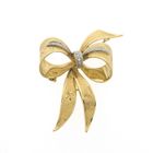Image 1 of Gold brooch in the form of a bow with diamonds; 0.035 ct.