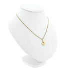 Image 8 of Gold pendant of a football with a shoe