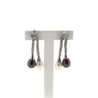 White gold entourage earrings with pearl and diamonds; 1.18 ct.