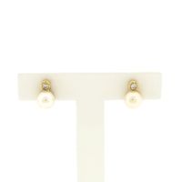 Gold stud earrings with pearl and zirconia