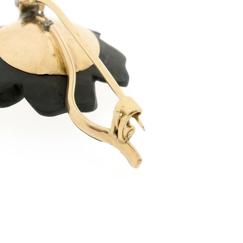 Image 4 of Gold flower brooch with onyx and diamond | 0.60 ct.