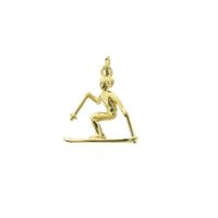 Gold pendant of a skier