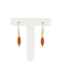 Gold earrings with red coral