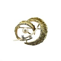 Two-tone gold fantasy brooch with diamond and pearl
