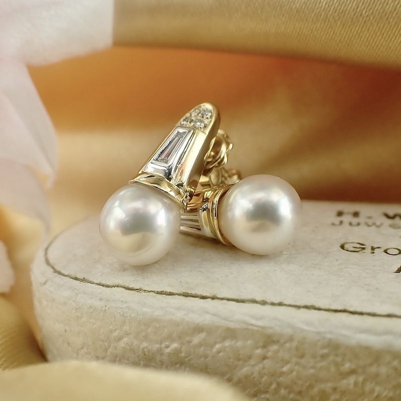 Image 2 of 18 carat gold stud earrings with cultured pearl and 0.18 ct diamond.