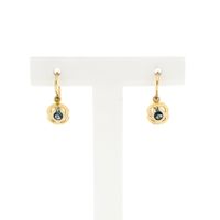 18 Krt. Bicolor gouden oorbellen met topaas 